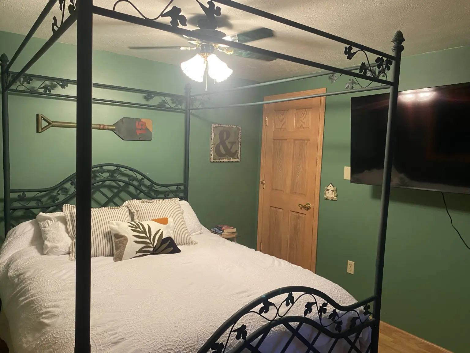 Primary bedroom at The Loon Hollow