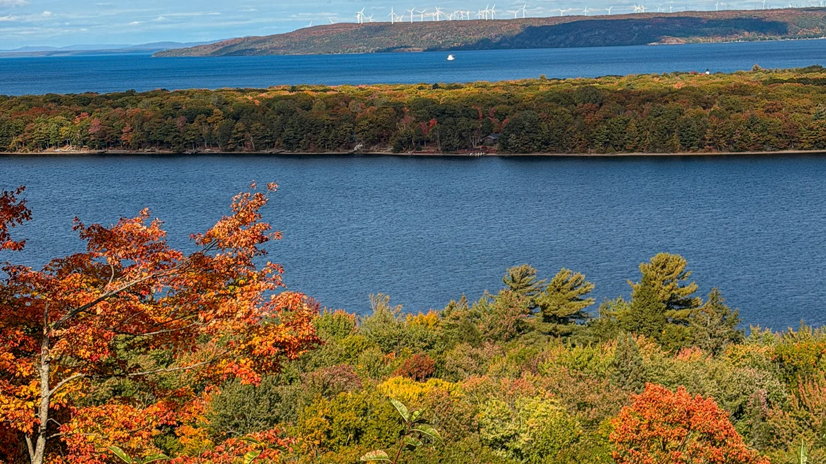 Colorful foreground trees overlooking Monocle Lake and Lake Superior