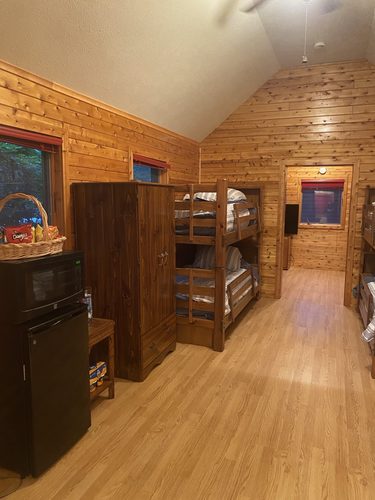 Wood-lined bunkhouse adventure lodge