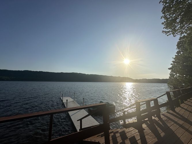 Sun sparkling over the dock and deck